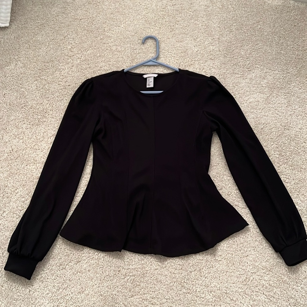 Long sleeve peplum, ribbed material. Size small.